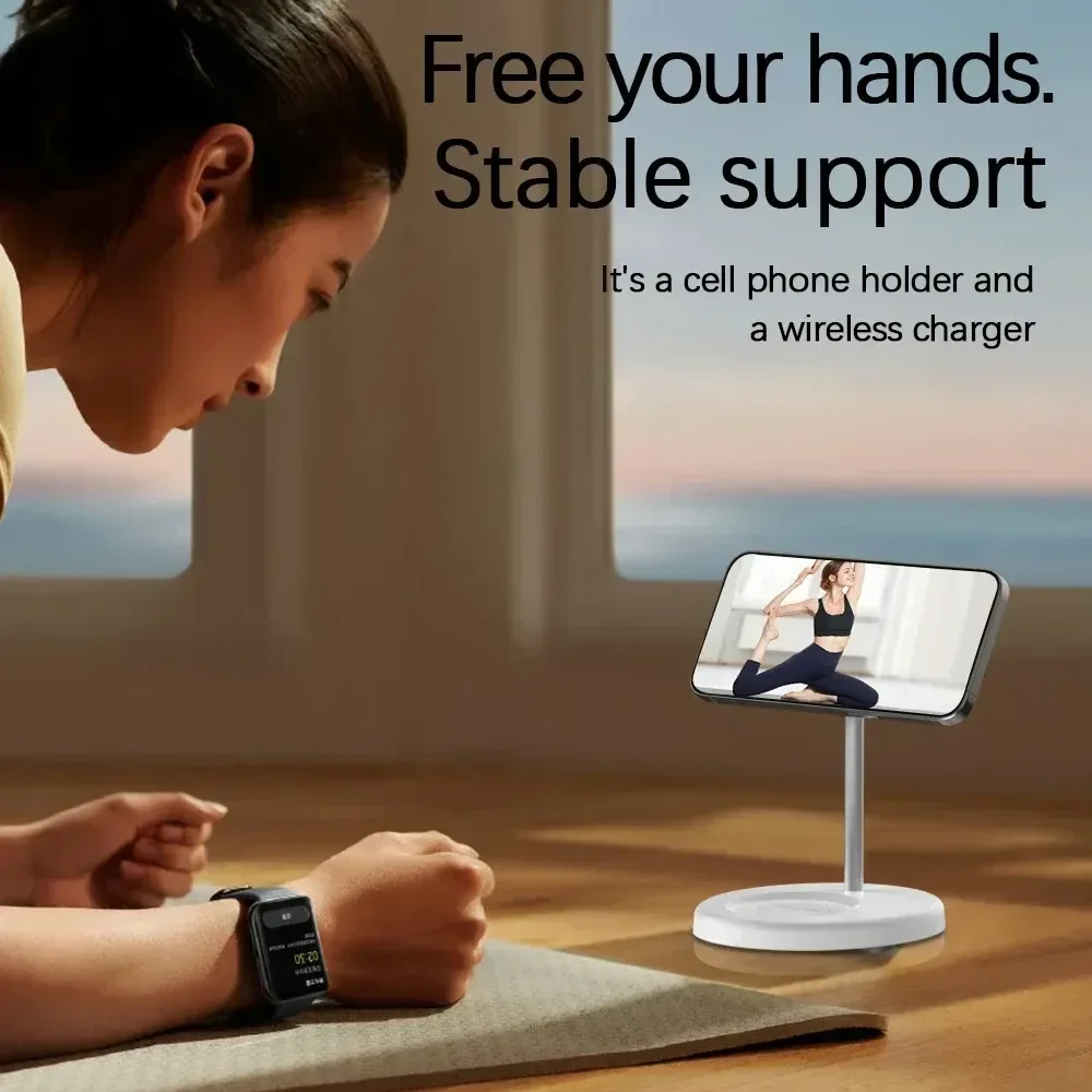 A magnetic three-in-one charging stand holding a phone upright beside a watch and earbuds